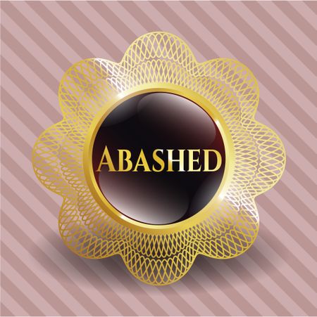 Abashed golden emblem or badge