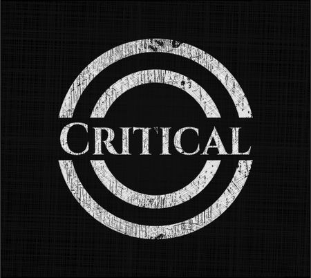 Critical chalkboard emblem on black board