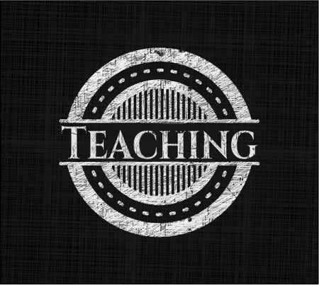 Teaching chalkboard emblem written on a blackboard