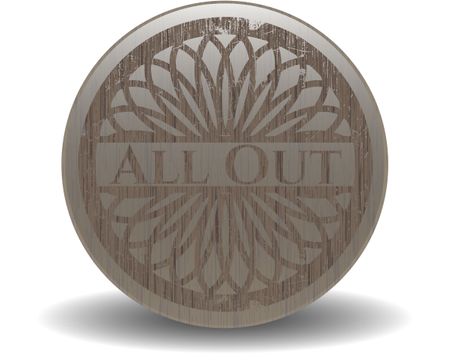 All Out badge with wooden background
