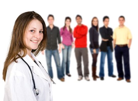 female doctor holding a stethoscope with a group of casual people behind her