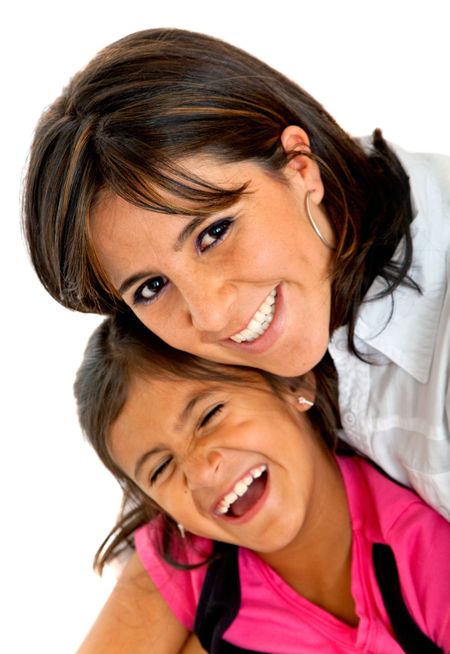 mother and daughter smiling isolated over a white background