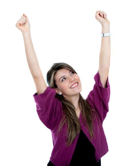 Happy young woman with arms up isolated over a white background