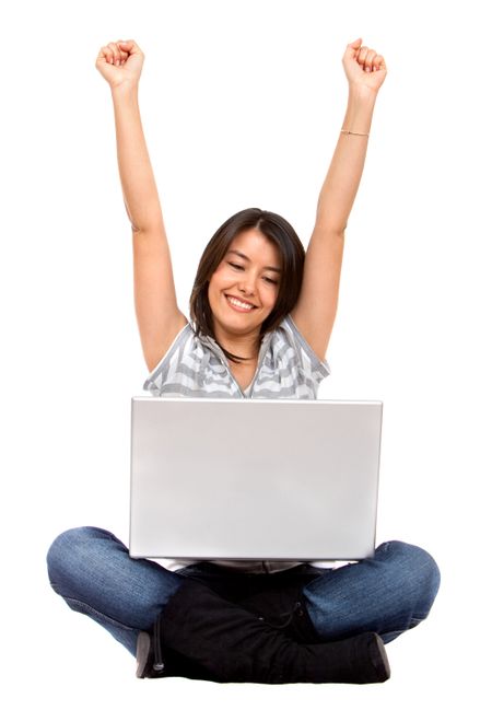 casual success girl on a laptop - isolated over a white background