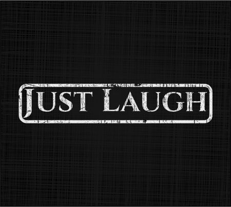 Just Laugh written on a chalkboard