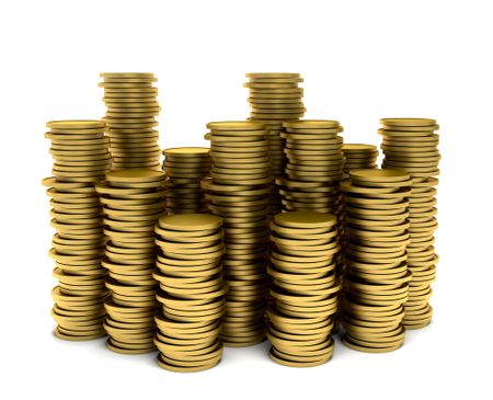 Piles of coins isolated over a white background