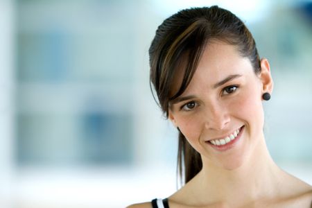 beautiful woman portrait at the gym smiling