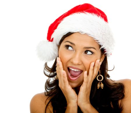 Surprised female Santa isolated over a white background