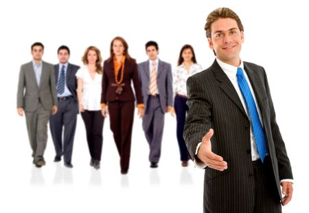 Businessman ready to hand shake with his teamwork behind isolated on white