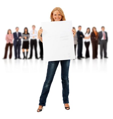 Business woman standing holding a banner with her teamwork behind isolated on white