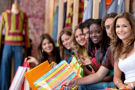group-shopping-people-store-smiling-41634550 Group of shopping people at a store smiling