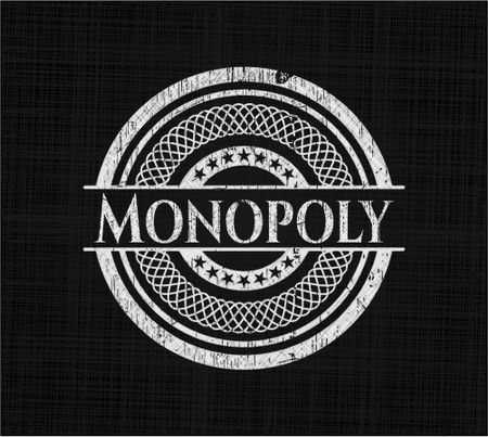 Monopoly chalk emblem written on a blackboard