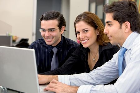 Business group with a laptop at the office