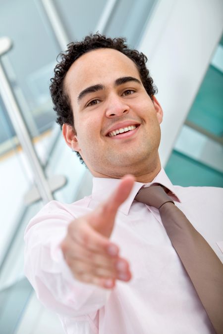 business man at the office ready to handshake