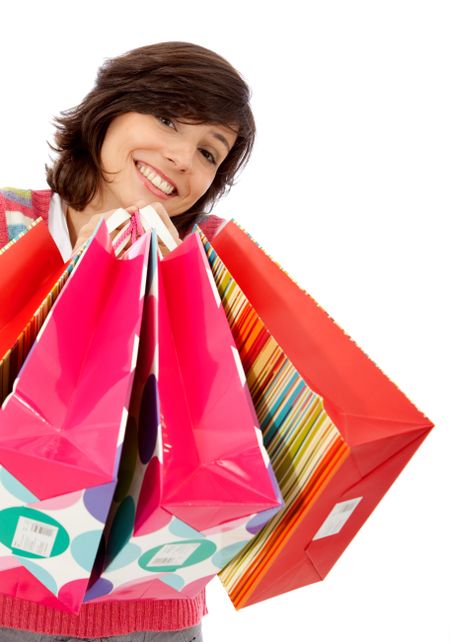 Woman with shopping bags isolated over a white background