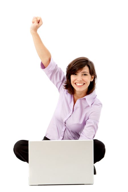 Excited business woman with a computer isolated over white