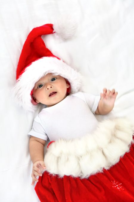 Christmas baby boy isolated over a white background