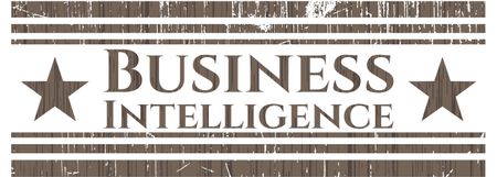 Business Intelligence badge with wooden background