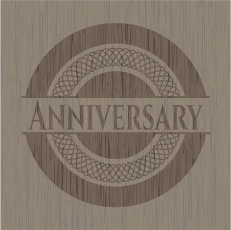 Anniversary badge with wooden background