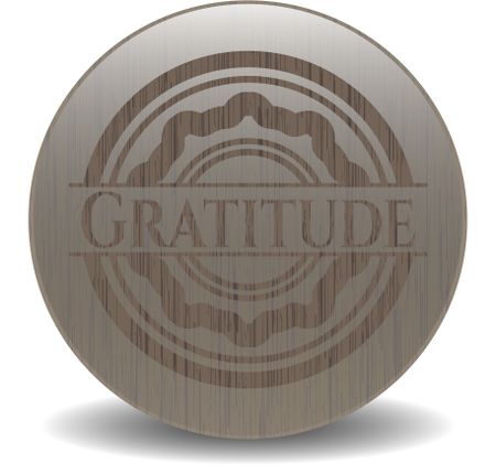 Gratitude badge with wooden background