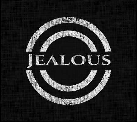 Jealous chalk emblem written on a blackboard