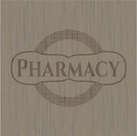 Pharmacy badge with wood background