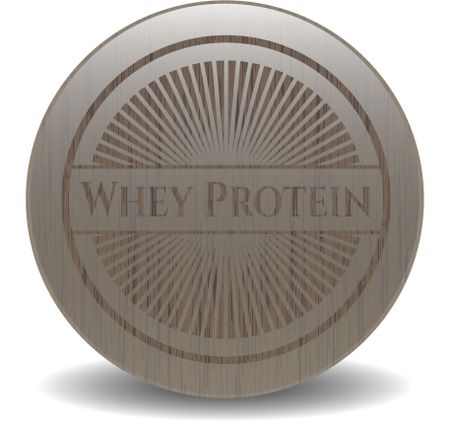 Whey Protein badge with wooden background