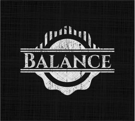 Balance chalk emblem written on a blackboard