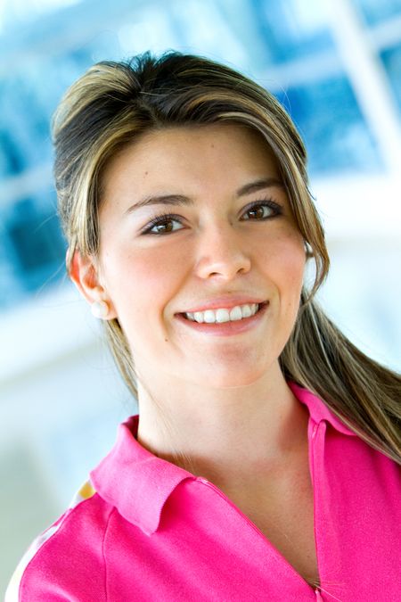 fitness woman smiling and looking happy at the gym