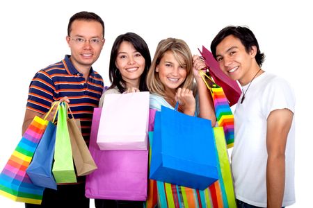 Group of shopping friends with some bags isolated over white