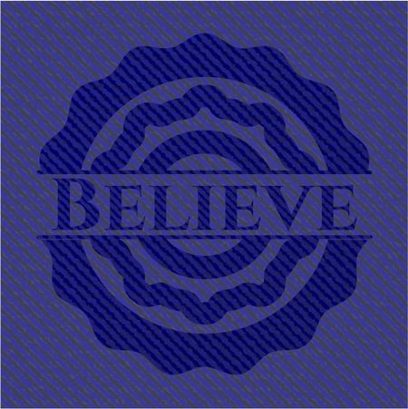 Believe badge with denim background