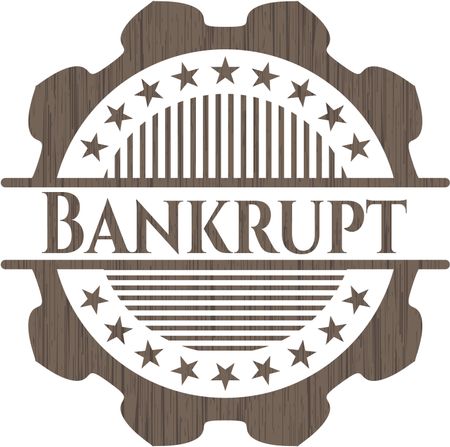 Bankrupt badge with wood background