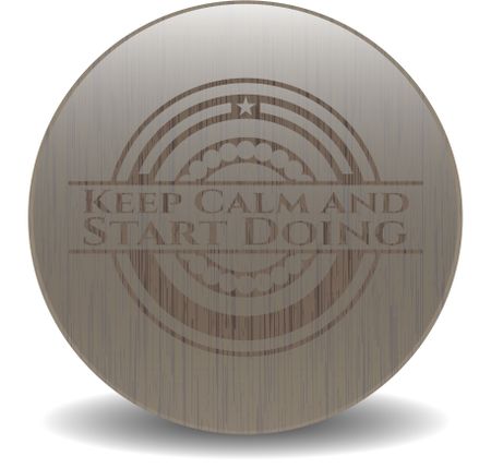 Keep Calm and Start Doing badge with wood background