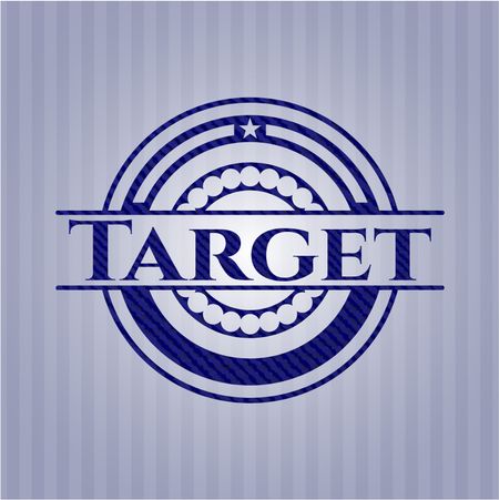 Target badge with denim background