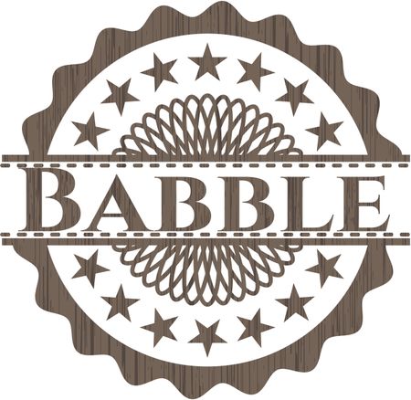 Babble badge with wooden background