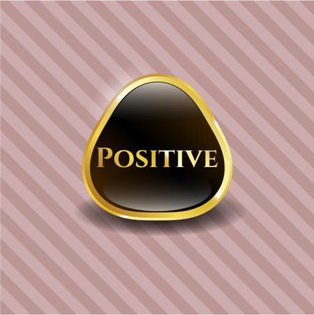 Positive gold emblem