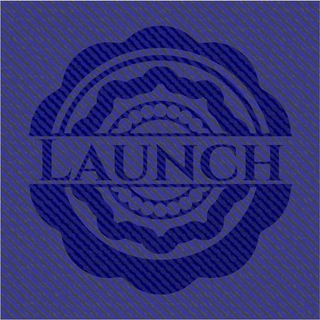Launch emblem with denim texture