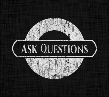 Ask Questions written on a chalkboard
