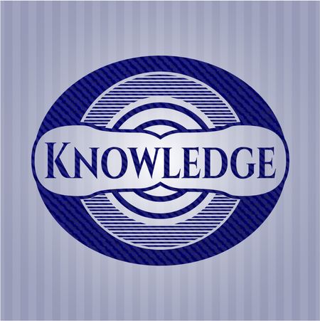Knowledge badge with denim background