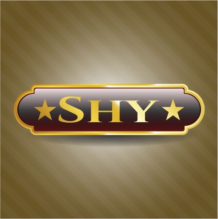 Shy gold emblem or badge