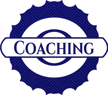 Coaching badge with denim background