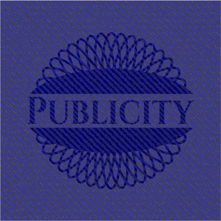 Publicity badge with denim background