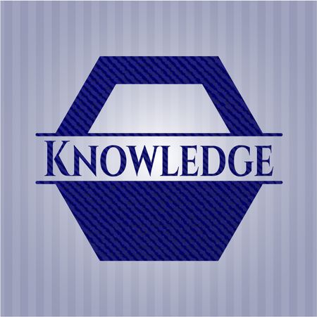 Knowledge emblem with jean background
