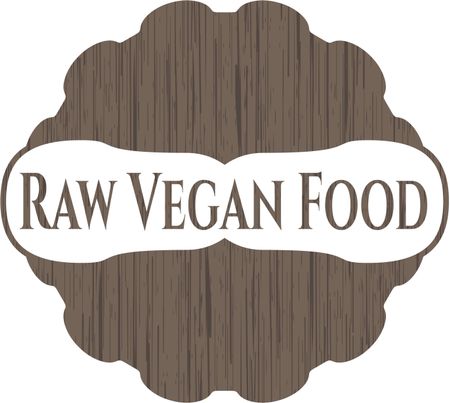 Raw Vegan Food badge with wooden background