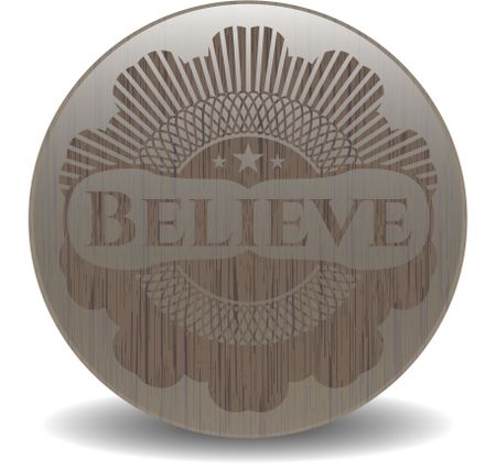 Believe wooden emblem
