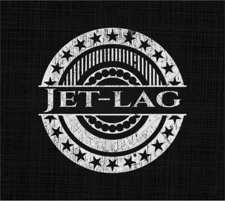 Jet-lag chalkboard emblem on black board