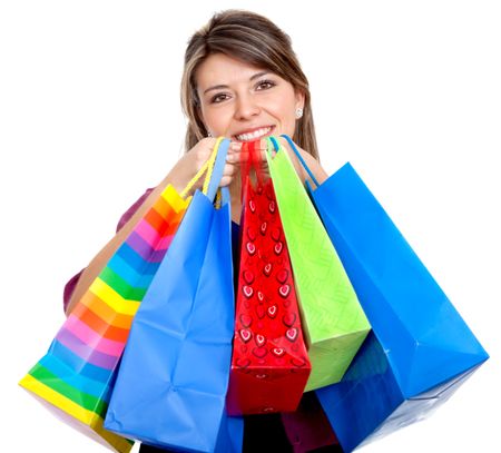 woman with shopping bags isolated over a white background