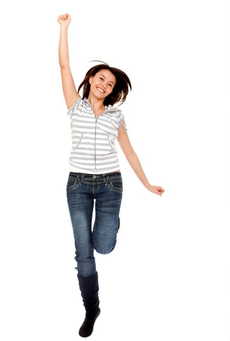 Happy woman jumping isolated over a white background