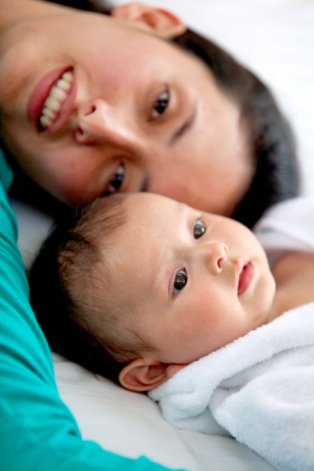 Beautiful portrait of a young mother and her baby