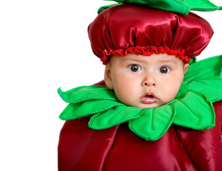 Baby boy in a fruit costume isolated over a white background